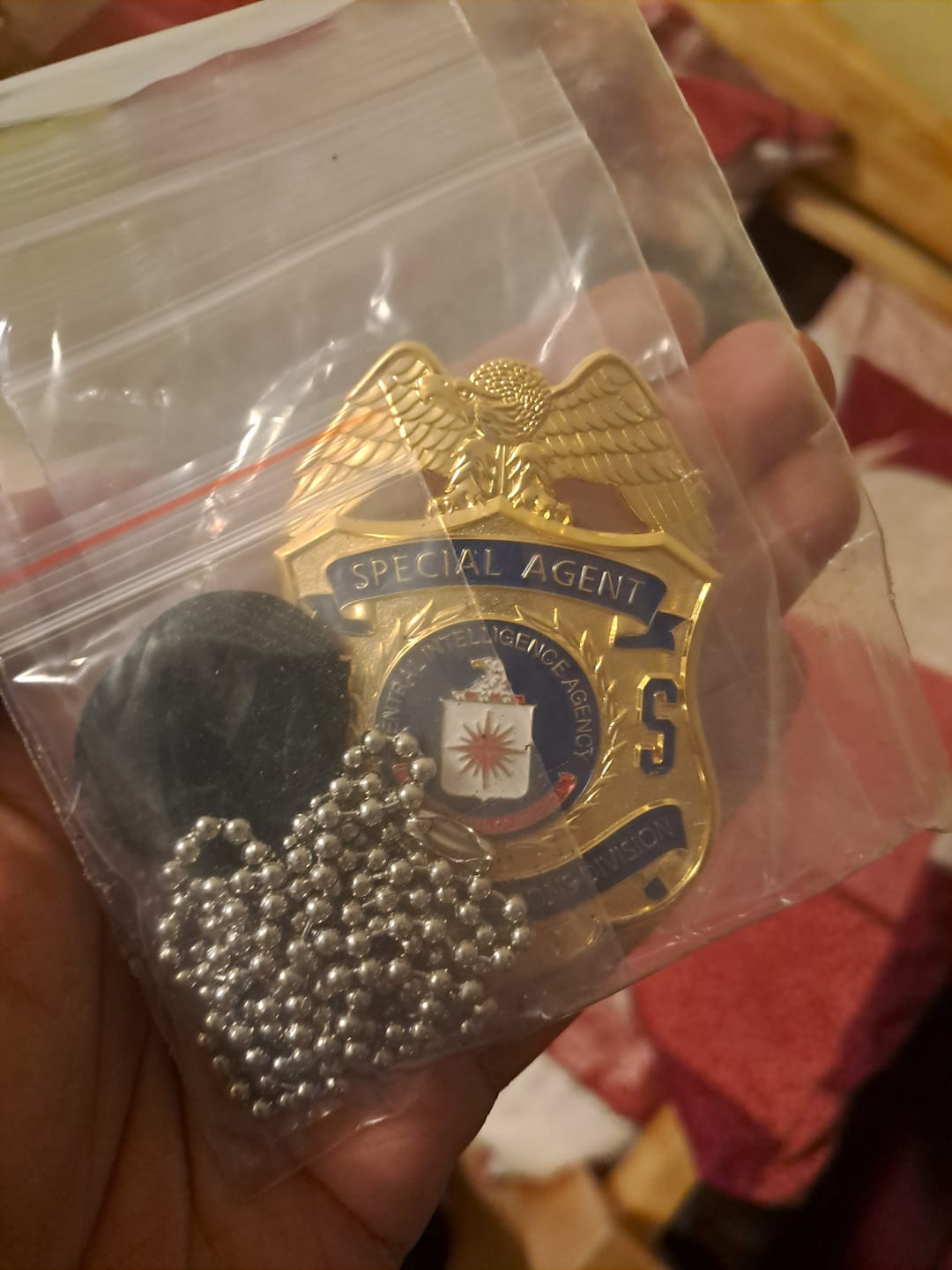 Customer photo review of CIA Protective Operations Division Special Agent Badge Solid Copper Replica Movie Props #943