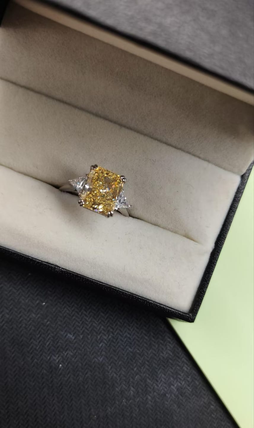 Customer photo review of S925 4.0Ct Radiant & Triangle Cut Yellow Stone Three Stone Engagement Ring In Sterling Silver