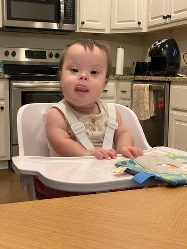 Customer photo review of Modern Baby High Chair + Convertible Toddler Chair