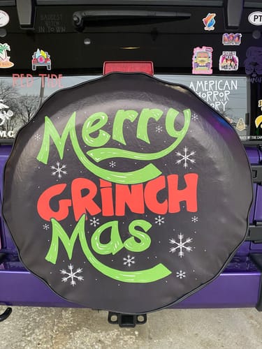 Customer photo review of Merry Grinch-Mas | Holiday, Christmas Spare Tire Cover - Jeep, Bronco, RV, Camper & More