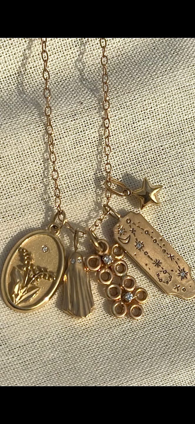 Customer photo review of 14k Puffed Star Charm