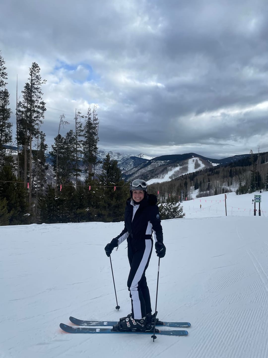 Customer photo review of Women's Minimalist Faux Fur Black & White Down One-piece Ski Suits