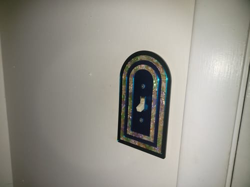 Customer photo review of Layered Archway Light Switch Cover