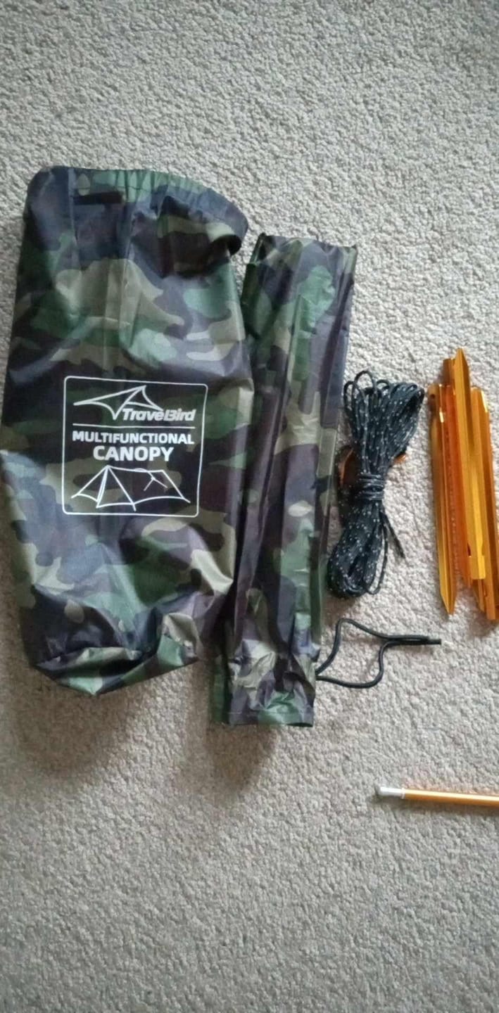 Customer photo review of Ultralight Hammock Rain Fly Tarp Camping Tent Waterproof Portable Rain Tarp Canopy with Doors Multifunctional Bushcraft Tarp for Outdoor Backpacking Hiking