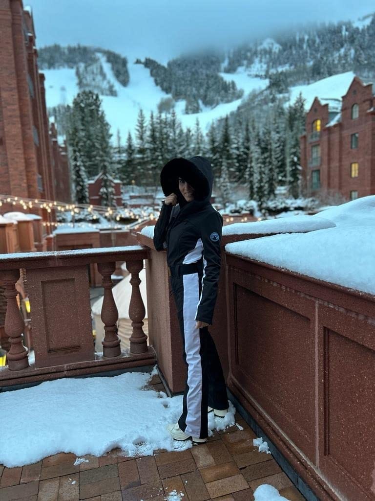 Customer photo review of Women's Minimalist Faux Fur Black & White Down One-piece Ski Suits