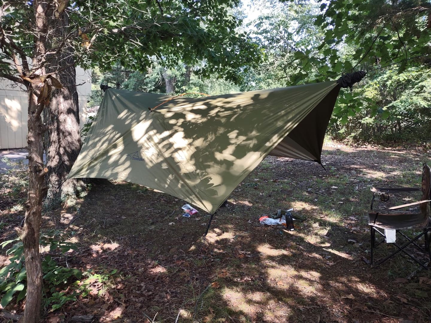 Customer photo review of Ultralight Hammock Rain Fly Tarp Camping Tent Waterproof Portable Rain Tarp Canopy with Doors Multifunctional Bushcraft Tarp for Outdoor Backpacking Hiking