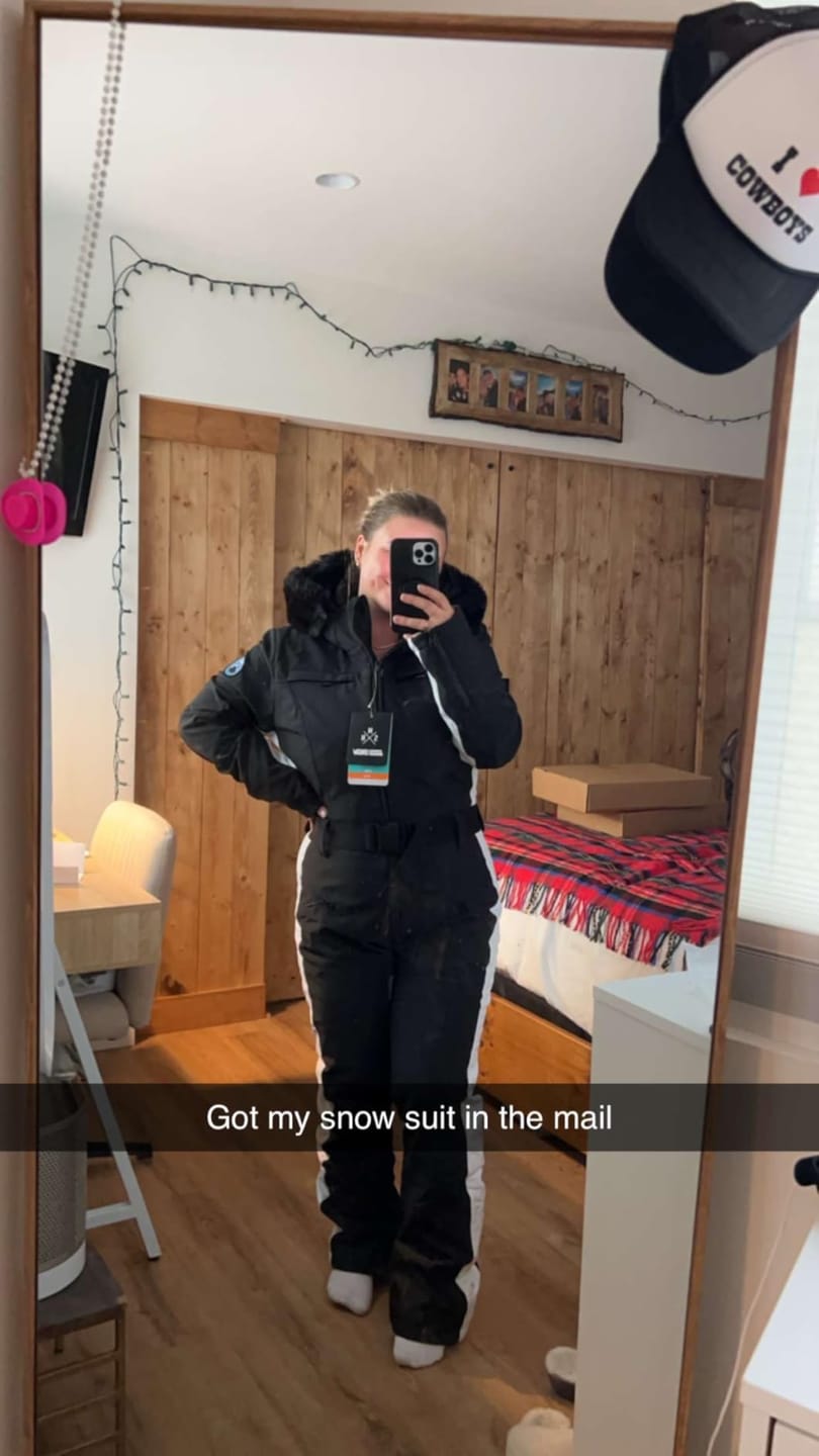 Customer photo review of Women's Minimalist Faux Fur Black & White Down One-piece Ski Suits