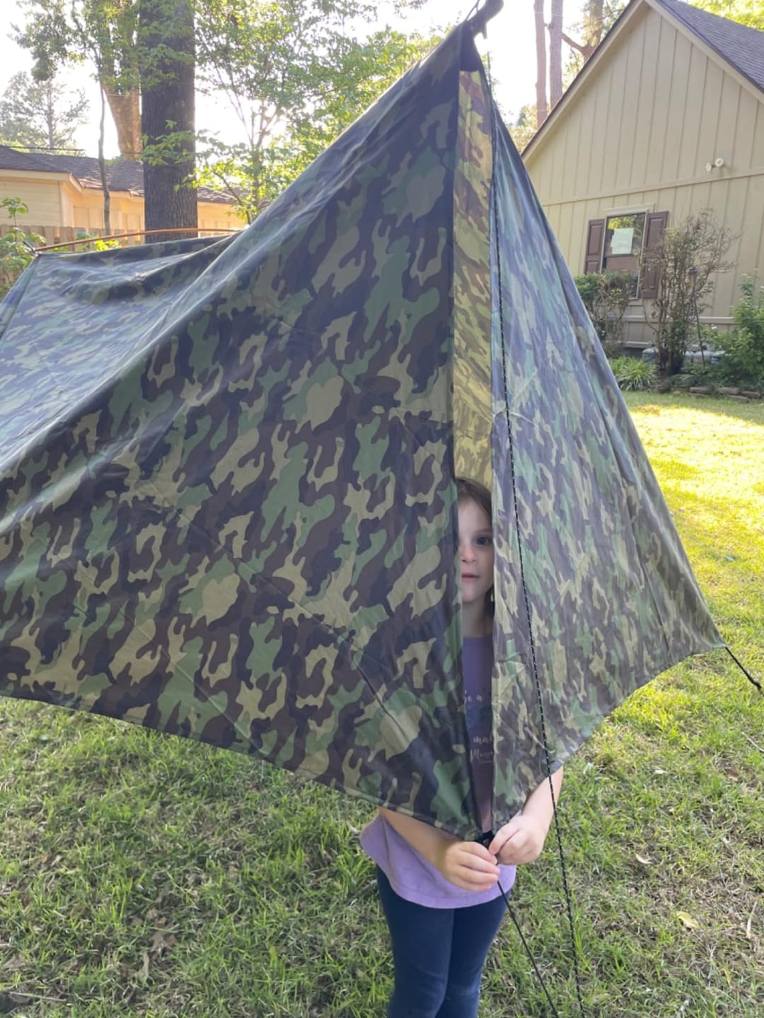 Customer photo review of Ultralight Hammock Rain Fly Tarp Camping Tent Waterproof Portable Rain Tarp Canopy with Doors Multifunctional Bushcraft Tarp for Outdoor Backpacking Hiking
