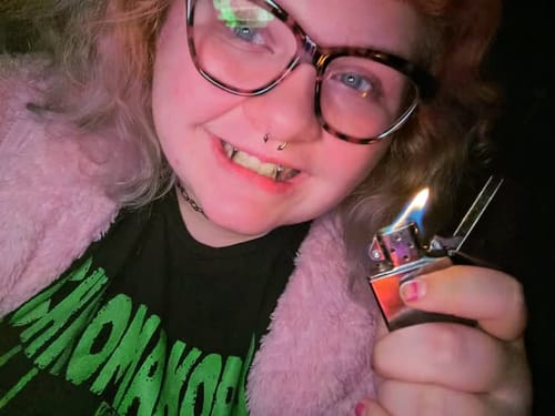 Customer photo review of Smiley Piercing Dracula Fangs