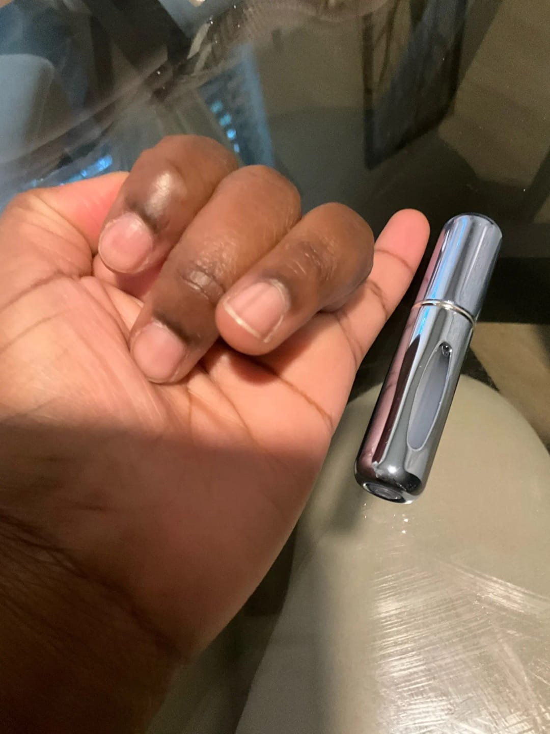 Customer photo review of Enamel-Coated Atomizer 5ml Perfume Bottle Refillable — Black | KIMLUD