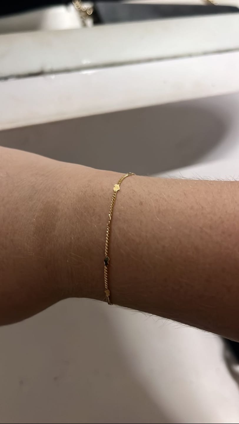 Customer photo review of Pulsera Con Corazones Planchados