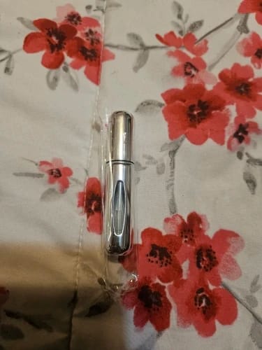 Customer photo review of Enamel-Coated Atomizer 5ml Perfume Bottle Refillable — Black | KIMLUD