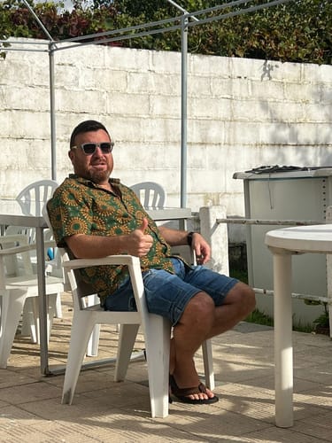 Customer photo review of Chemise à manches courtes rétro boutonnée d'été disco vintage des années 70 pour hommes