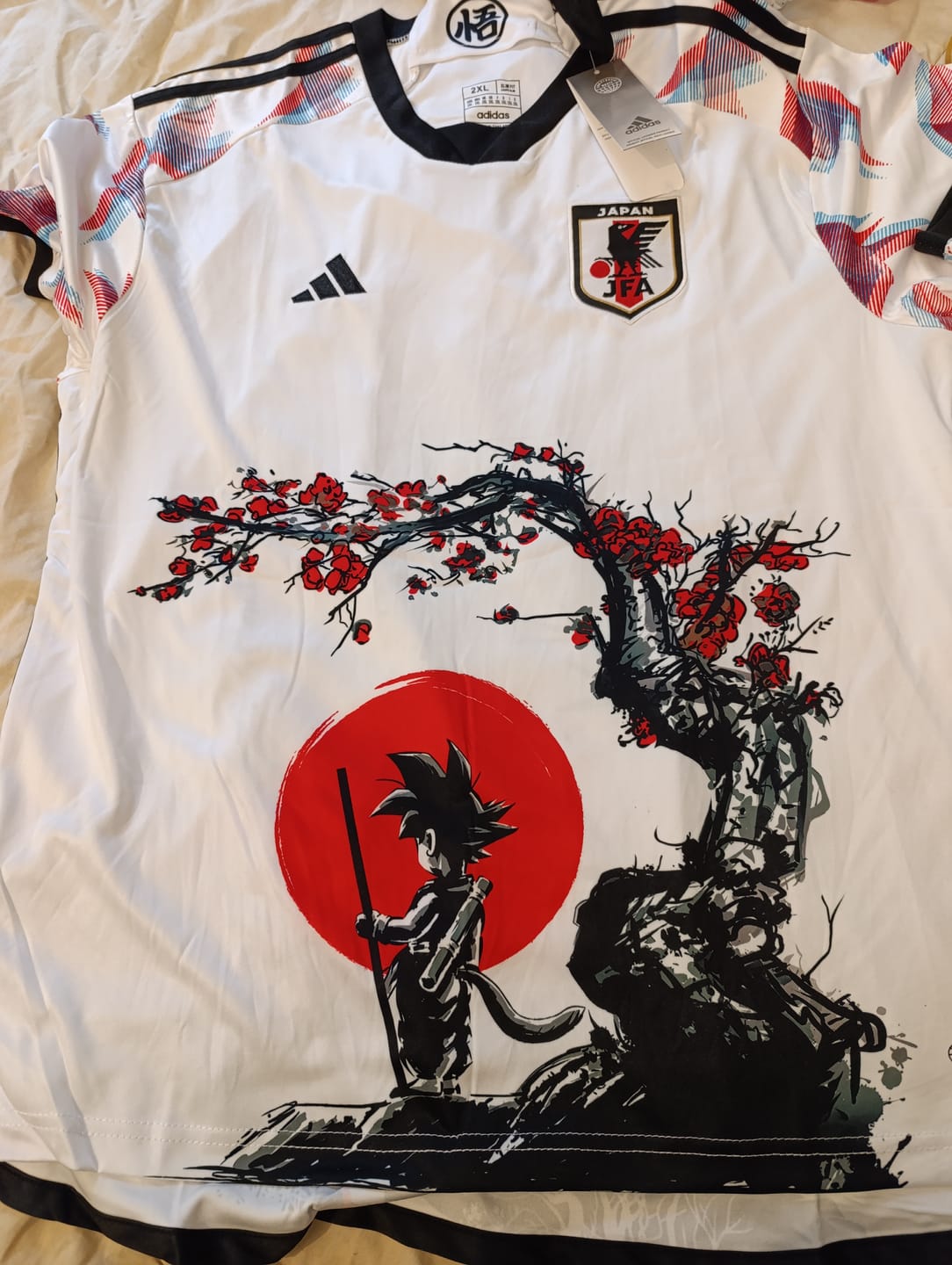 Customer photo review of MAILLOT JAPON 2022/23 - EXTERIEUR EDITION KID GOKU