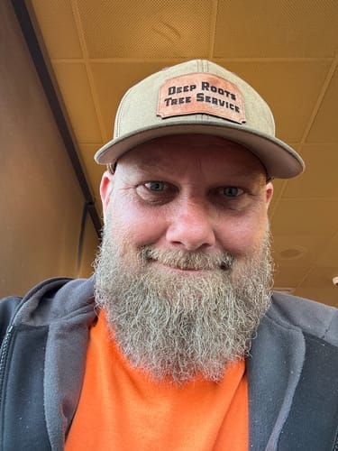 Customer photo review of Custom Leather Patch Trucker Hat - Flexfit 110