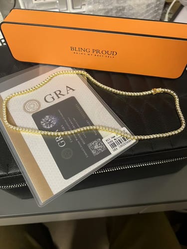 Customer photo review of VVS1 Moissanite Diamond 925 Sterling Silver Tennis Chain in 14K Gold