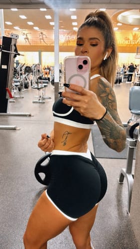 Customer photo review of Pchee Black and White Cross Back Sports Bra