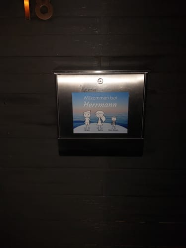 Customer photo review of Familien Türschild (UV- und wetterfest)