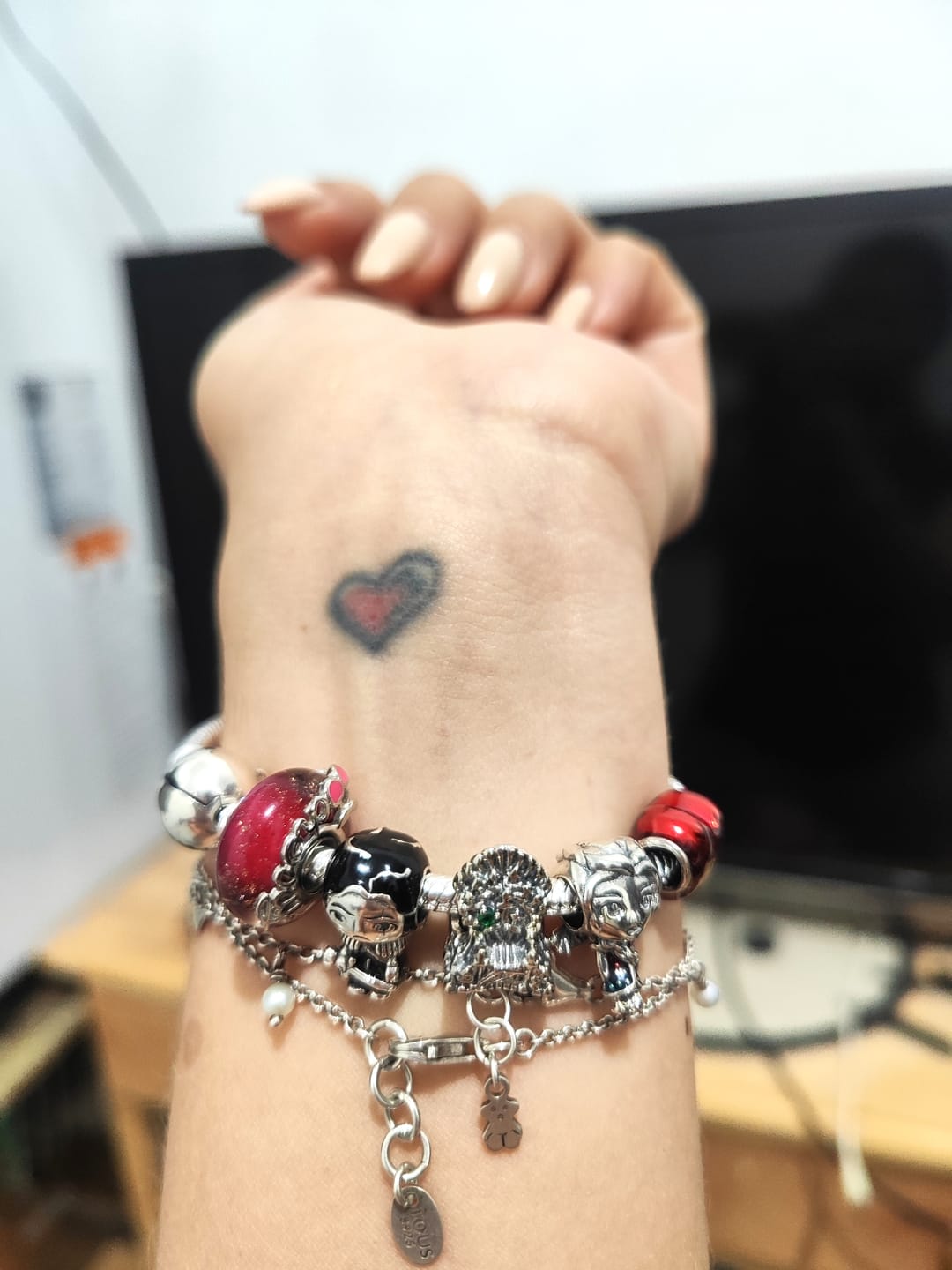 Customer photo review of Pulsera Esfera de Amor y Corazon