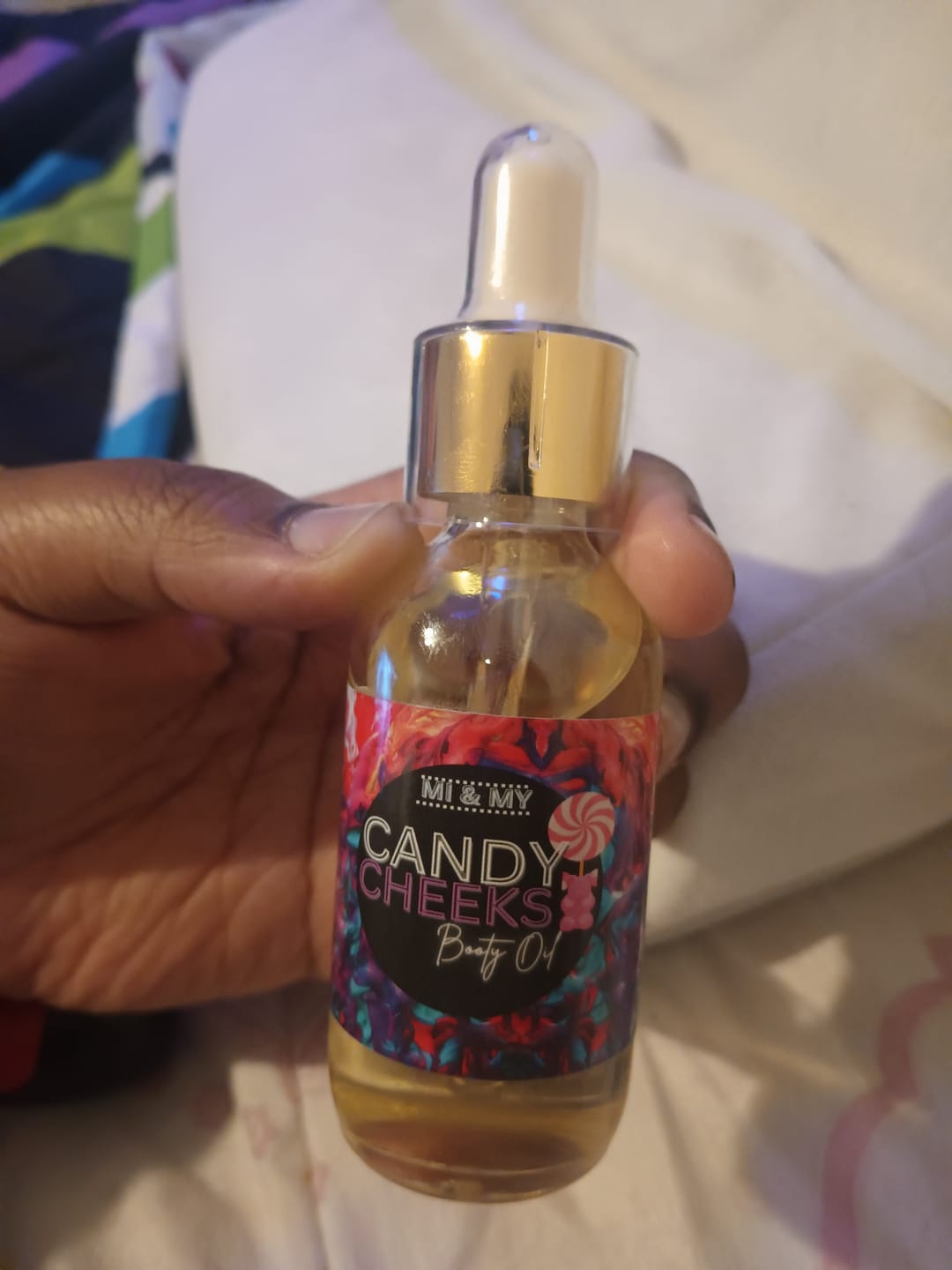 Customer photo review of Candy Cheeks Booty Oil - 3pk