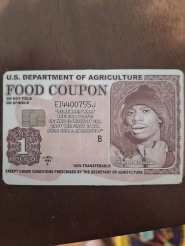 Customer photo review of Tyrone Biggums Food Coupon Debit/Credit Card Skin (2 Pack)