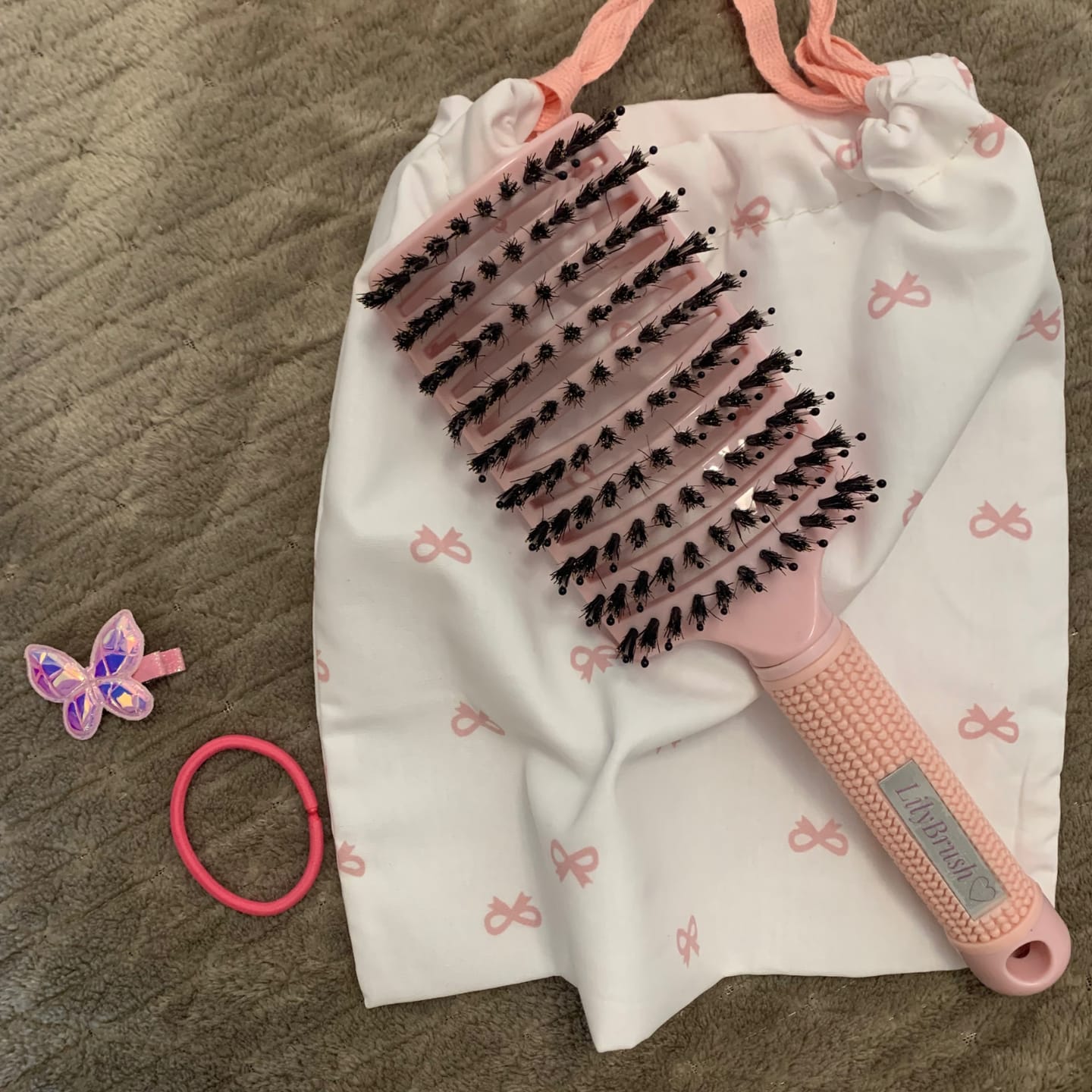 Customer photo review of Magical Detangling Brush & 10 Girly Hair Ties Set
