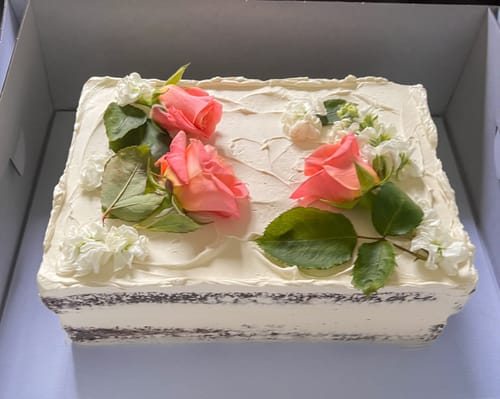 Customer photo review of floral sheet cake