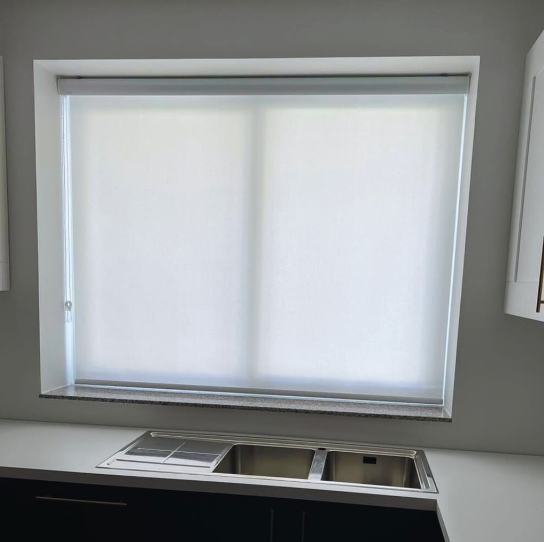 Customer photo review of Essence White Roller Blinds