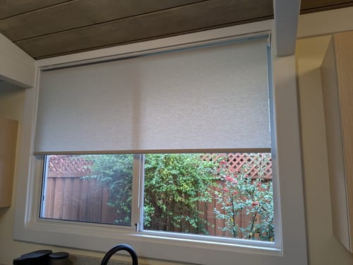 Customer photo review of SmartWings Motorized Light Filtering Roller Shades 70% Blackout Safari