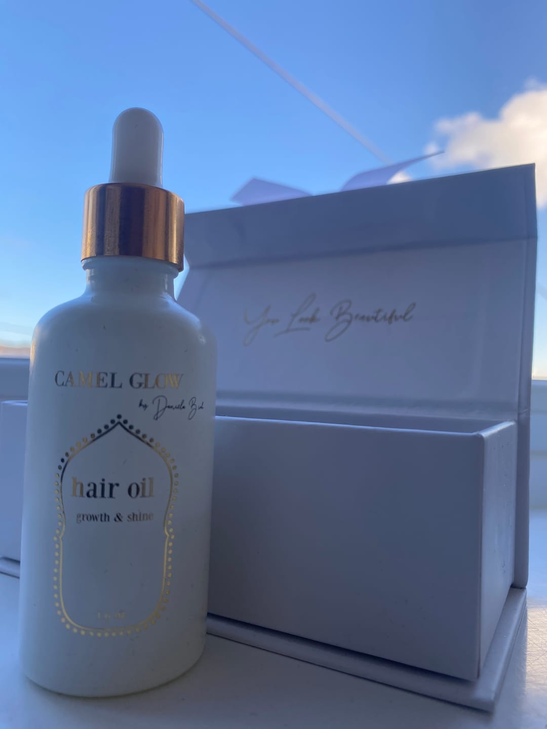 Customer photo review of Nourish & Shine Hair Oil