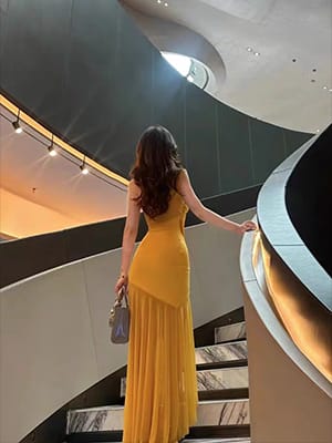 Customer photo review of Soleil Elegance Yellow Sleeveless Drape Dress