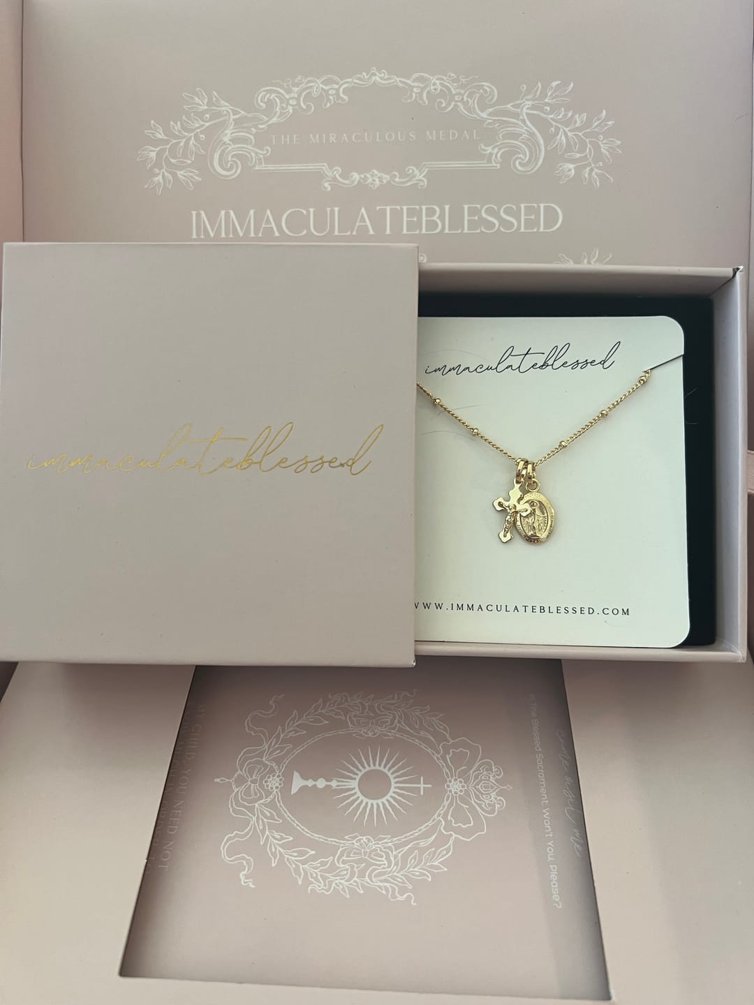 Customer photo review of Petite Miraculous Medal + Petite Crucifix Gold Filled Satellite Chain Necklace