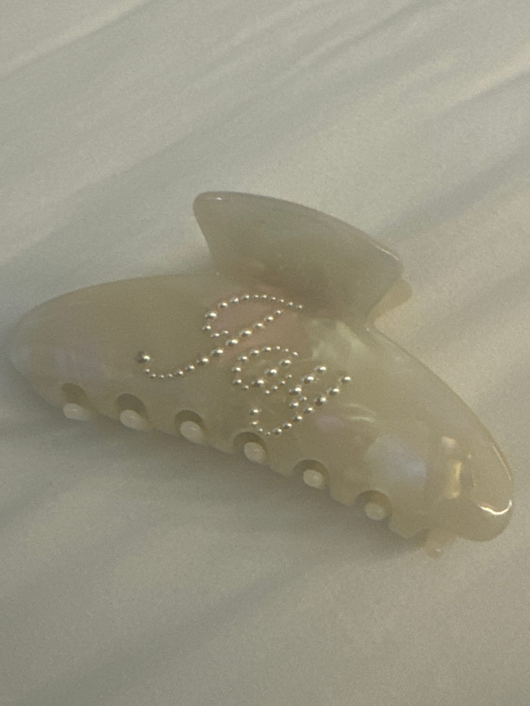 Customer photo review of The Customized Name Hair Claw In Shell White