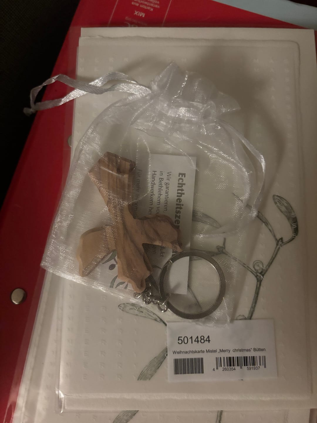 Customer photo review of Schlüsselanhänger Kreuz in Engel-Form