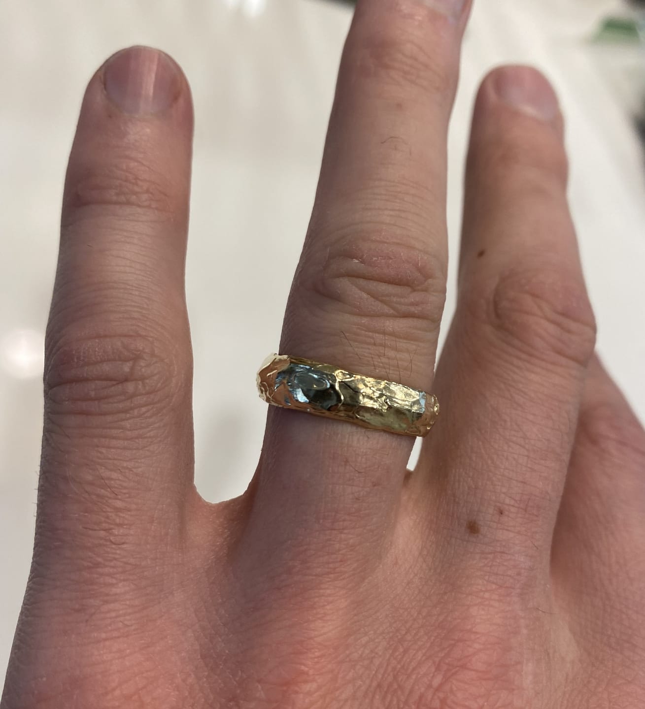 Customer photo review of Earth • Men's Molten Gold Textured Wedding Ring