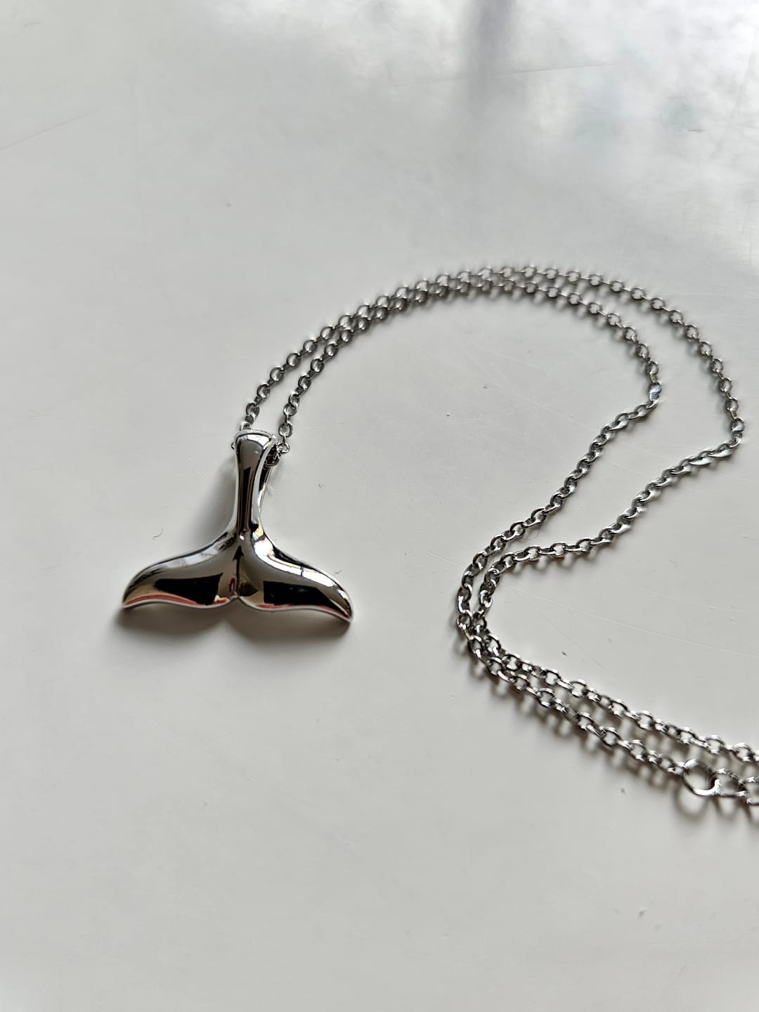 Customer photo review of Necklace Whale Fin - Silver or Gold