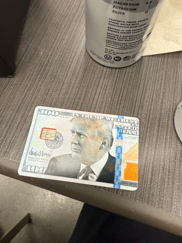 Customer photo review of Trump 100 Dollar Bill Credit Card Skin Decal