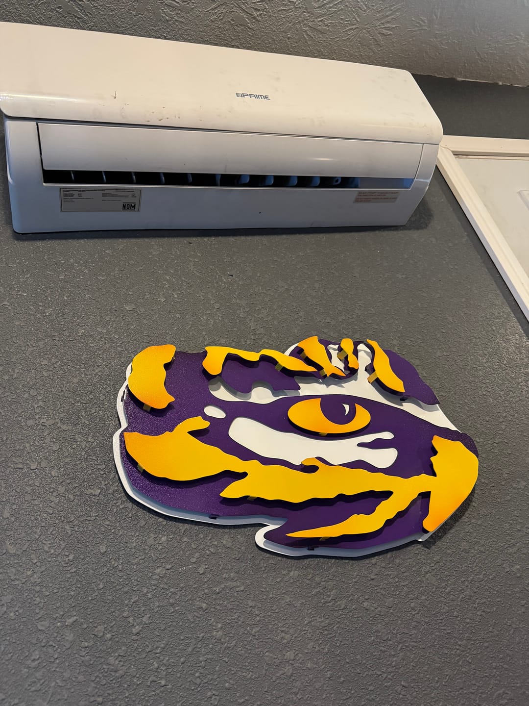 Customer photo review of LSU "Tiger Eye" 3D Vintage Metal Wall Art