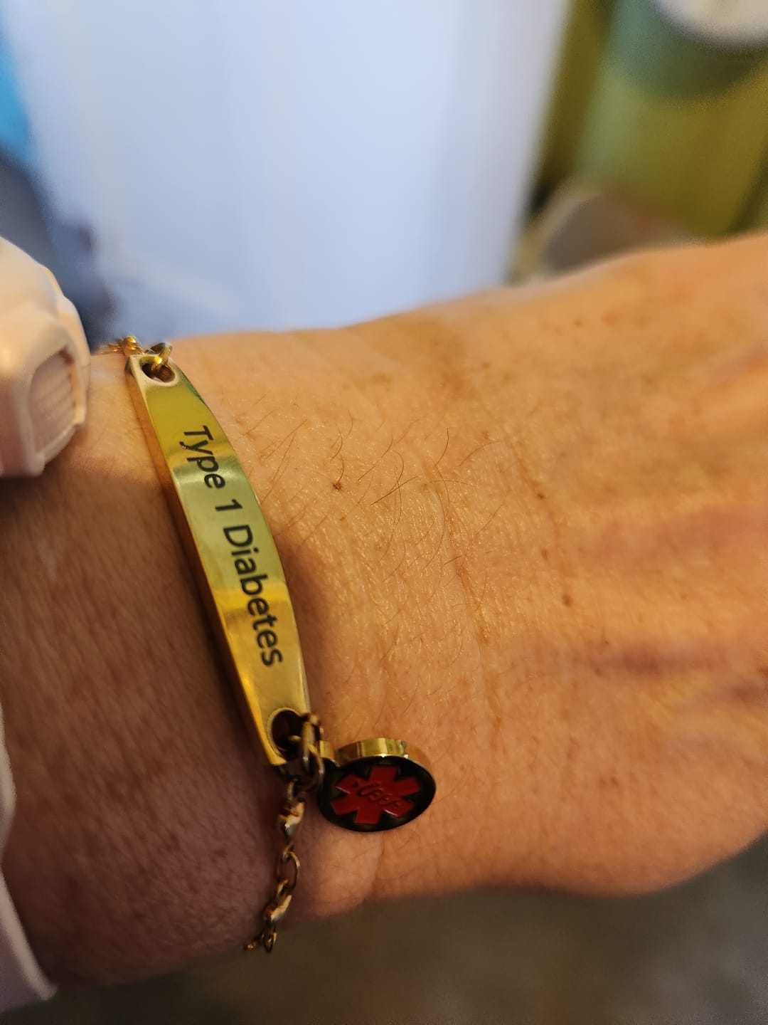 Customer photo review of Personalised Medical Alert Heart Link Bracelet - Gold Colour