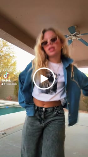 Customer video review of 'Roar' baby tee