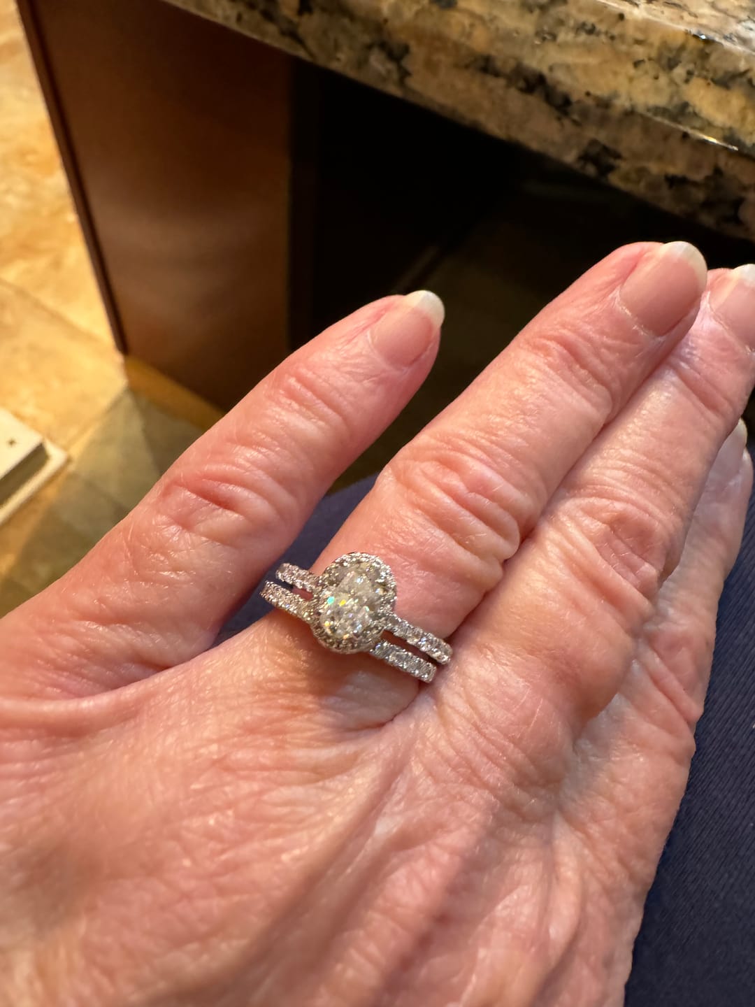 Customer photo review of Moissanite Round Half Eternity Sterling Silver Wedding Band Stackable Ring