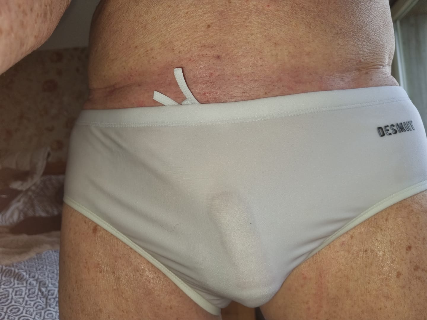 Customer photo review of Men’s Shiny Solid Color Swim Briefs