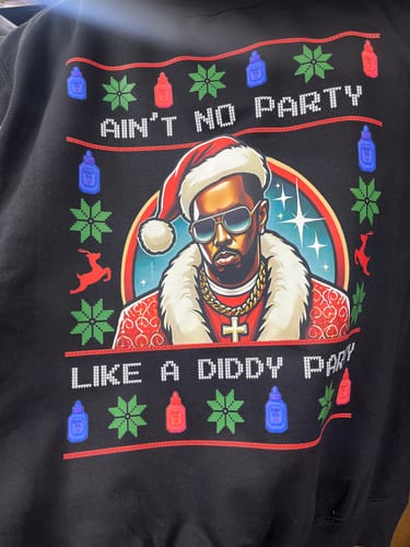 Customer photo review of Ain’t No Party Like a Diddy Party Ugly Christmas Sweater – Funny Holiday Hip-Hop Diddys Meme Sweater