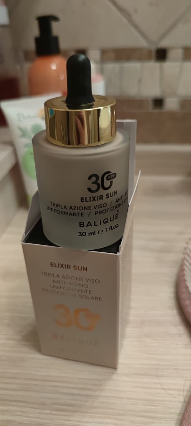 Customer photo review of ELIXIR SUN SPF30 - Siero Viso tripla azione