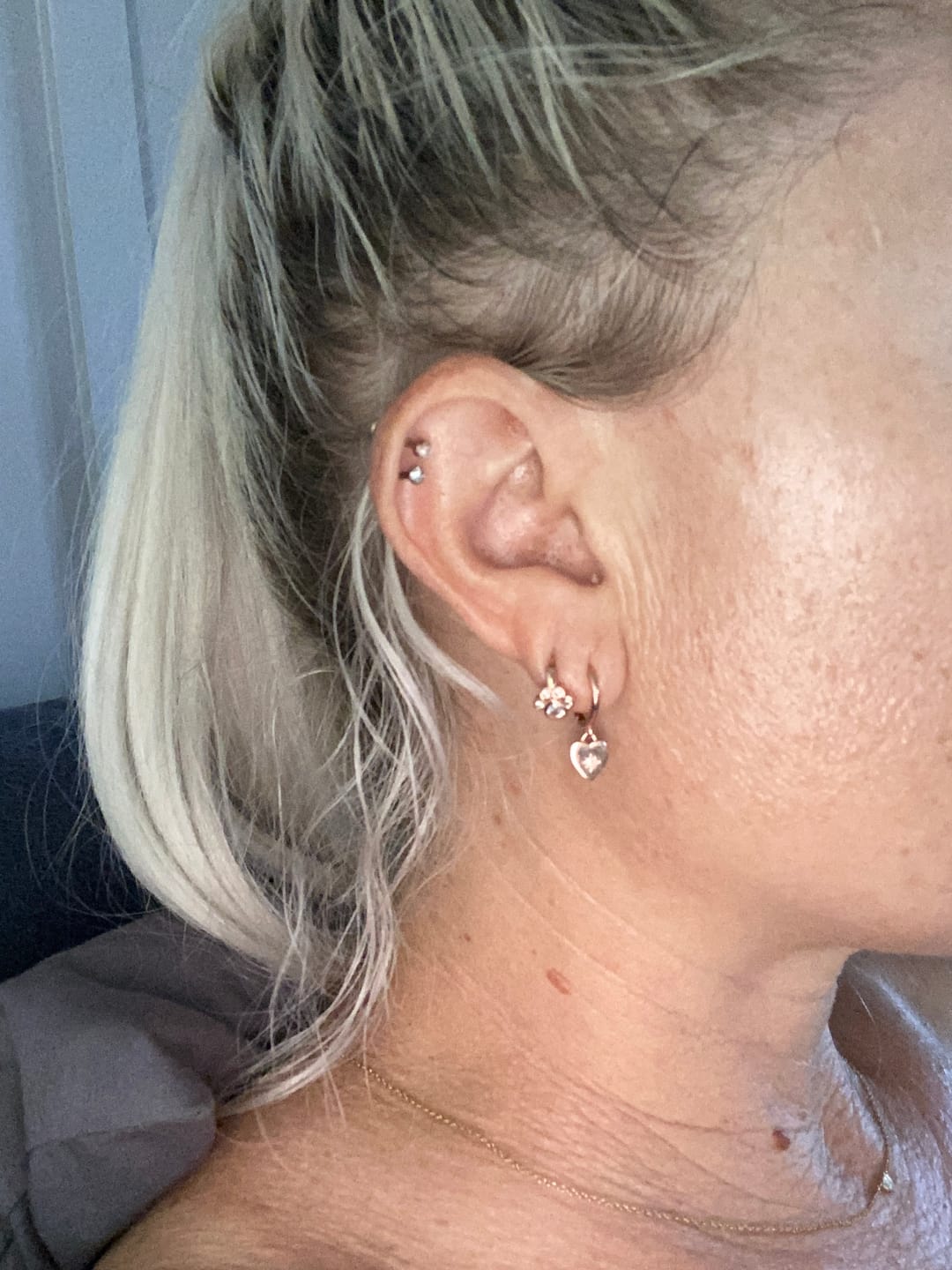 Customer photo review of Dog Paw Sapphire Huggie Earrings