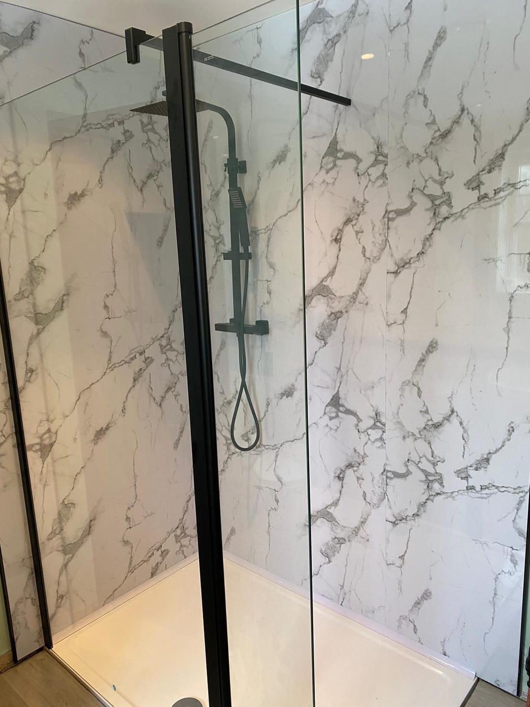 Customer photo review of Premium White Calcutta Gloss Shower Wall Panel – 2400 x 1000mm