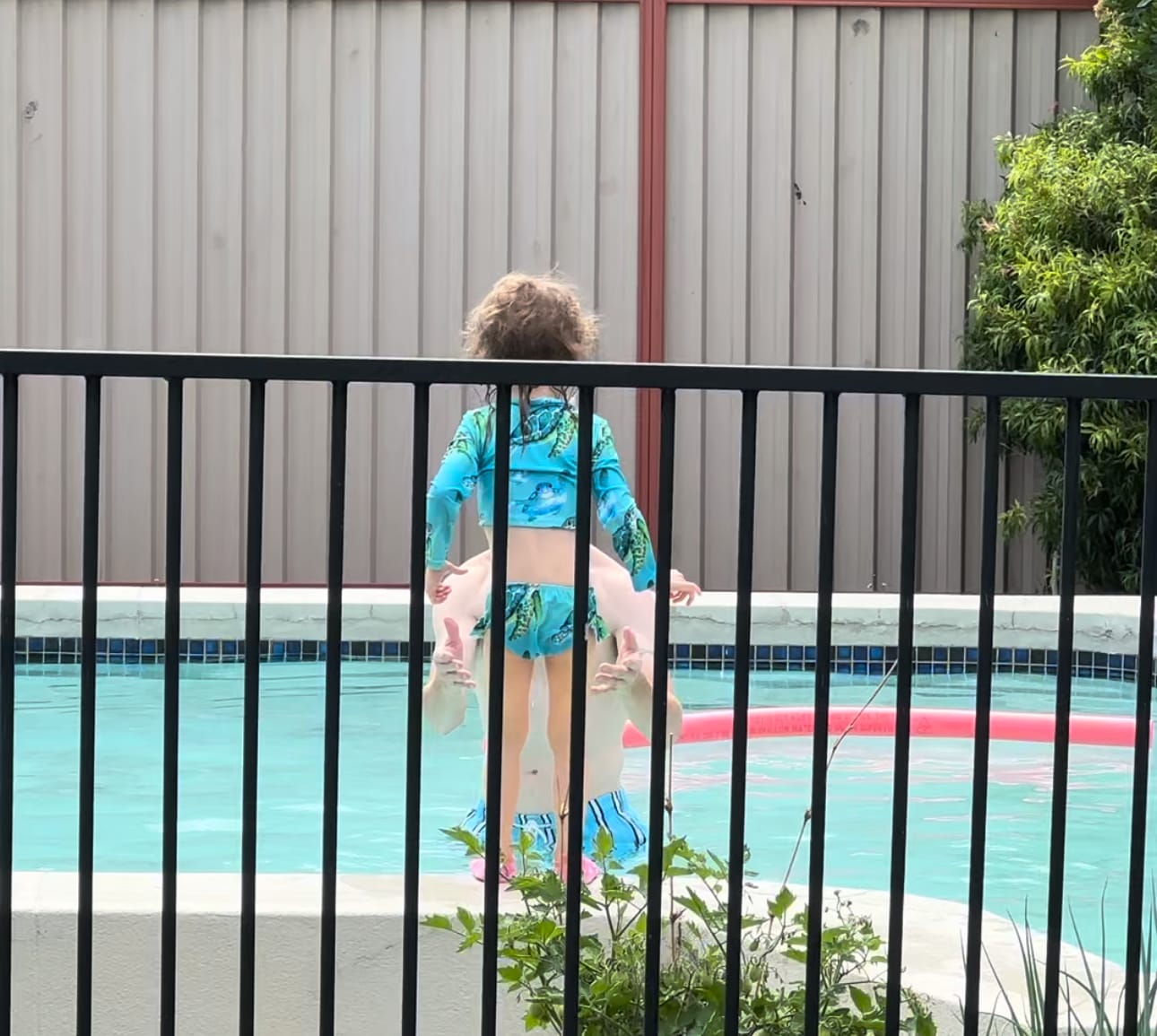 Customer photo review of Blue Turtle Girls Long Sleeve Two Piece Zip Swimmers
