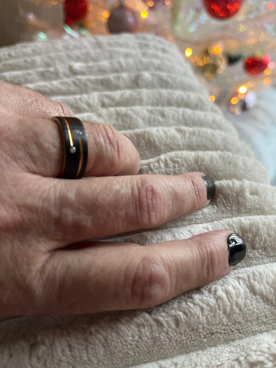 Customer photo review of Mens Black Tungsten Carbide Wedding Band with Gold Grooves 2 CZ Diamonds.