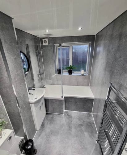 Customer photo review of Premium Grey Concrete Matt Shower Wall Panel – 2400 x 1000mm
