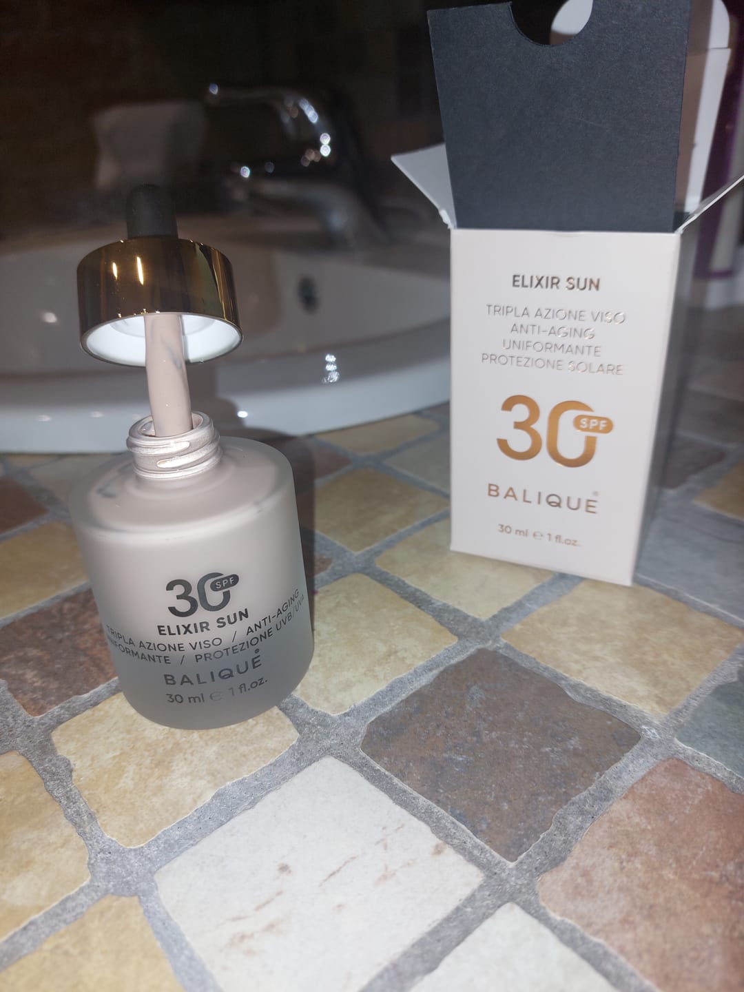 Customer photo review of ELIXIR SUN SPF30 - Siero Viso tripla azione